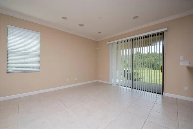 a view of a room with sliding glass door