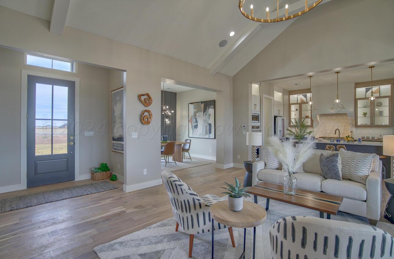 19181 Buck Springs Road Amarillo, TX 79119 - Photo 11 of 86 a living room with furniture and wooden floor