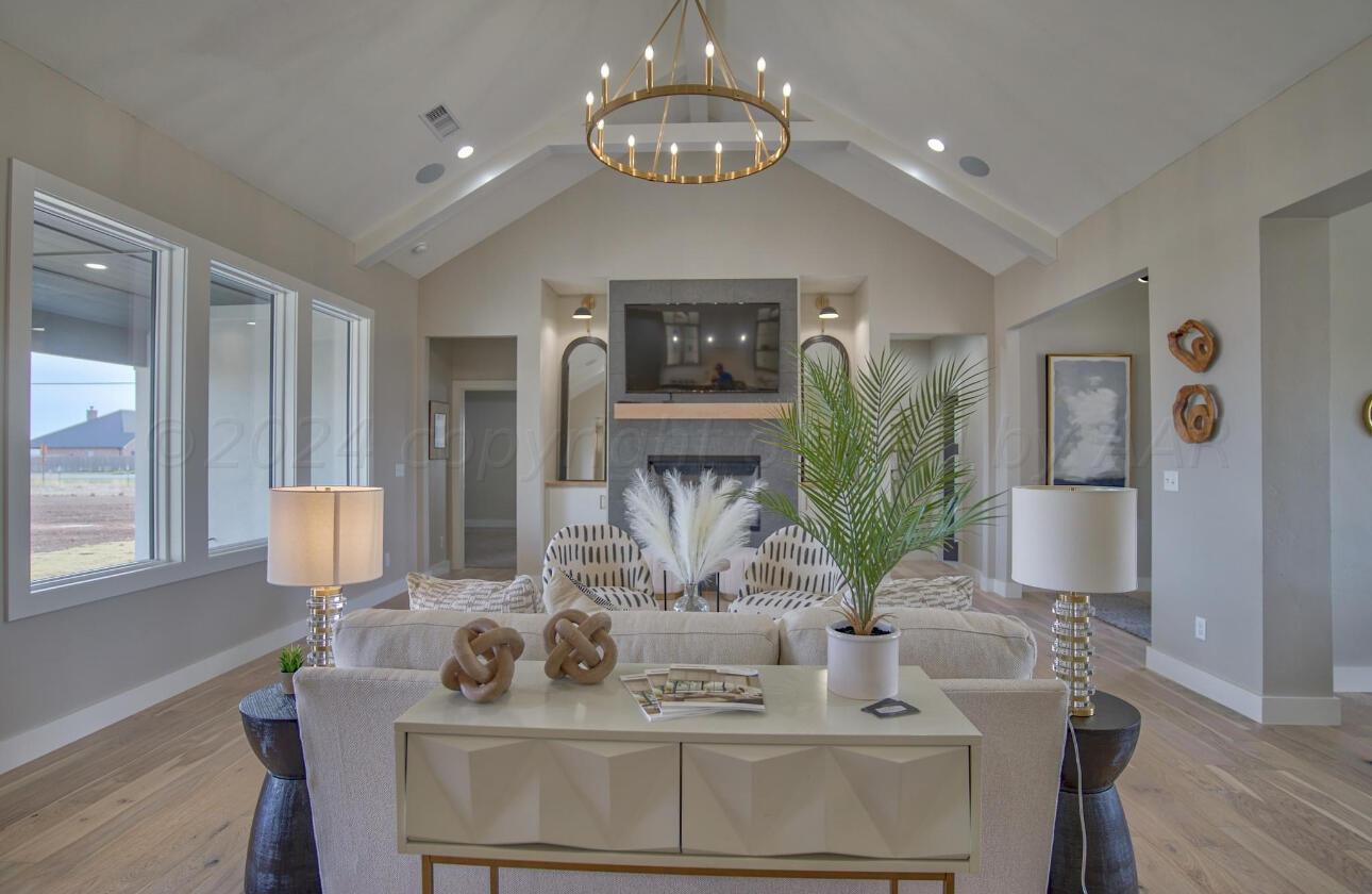 19181 Buck Springs Road Amarillo, TX 79119 - Photo 12 of 86 a view of a dining room with furniture and wooden floor