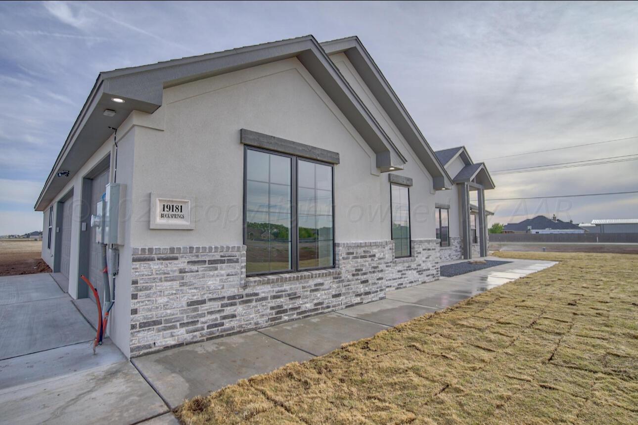 19181 Buck Springs Road Amarillo, TX 79119 - Photo 2 of 86 a view of a house with a yard