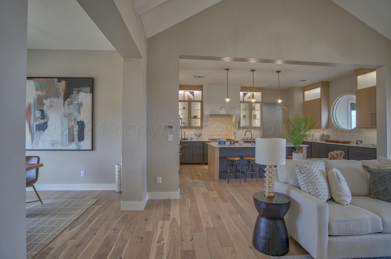 19181 Buck Springs Road Amarillo, TX 79119 - Photo 23 of 86 a living room with furniture and wooden floor