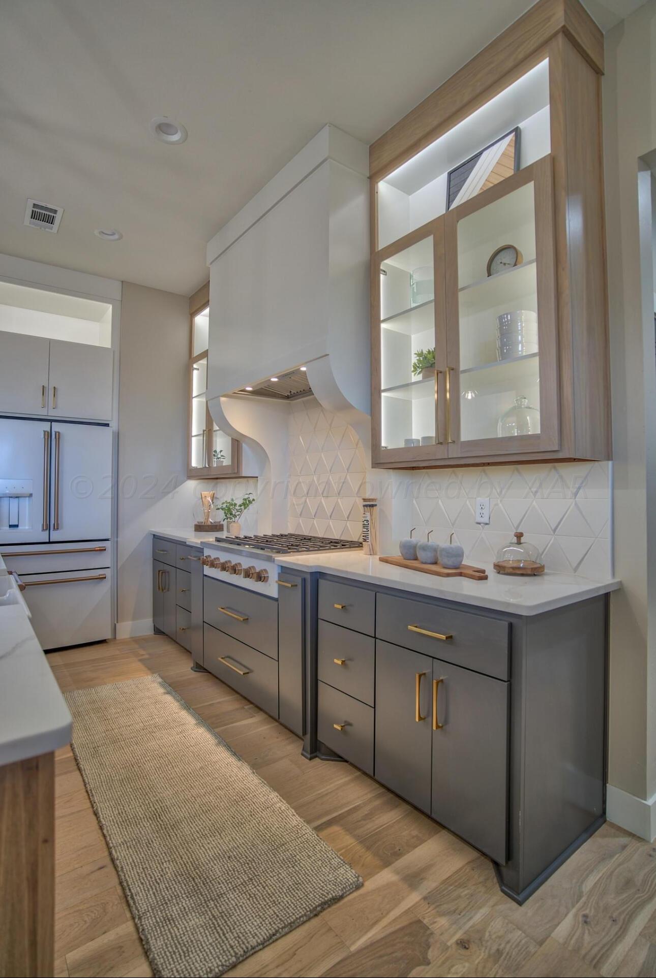 19181 Buck Springs Road Amarillo, TX 79119 - Photo 25 of 86 a spacious bathroom with a granite countertop sink mirror and a
