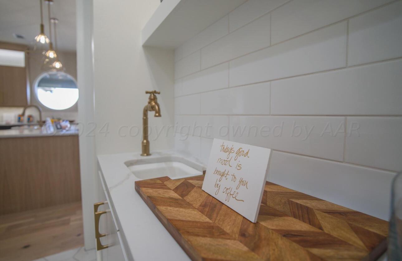 19181 Buck Springs Road Amarillo, TX 79119 - Photo 43 of 86 a view of a kitchen area with furniture and chandelier
