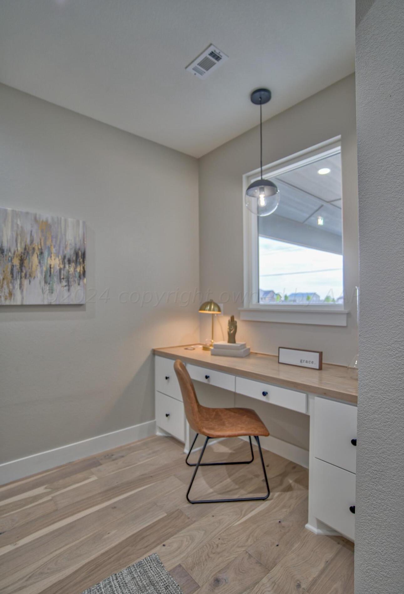 19181 Buck Springs Road Amarillo, TX 79119 - Photo 50 of 86 a room with a table chairs and windows