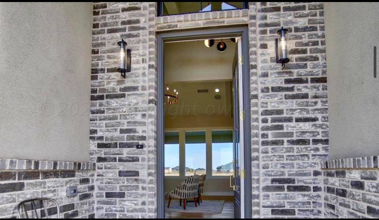 19181 Buck Springs Road Amarillo, TX 79119 - Photo 6 of 86 a bathroom with a shower and a sink