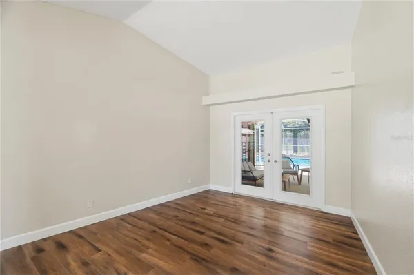 a view of a livingroom with wooden floor