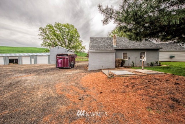 9590 Smith Springs Road Prescott, WA 99348 - Photo 36 of 40 a house view with a outdoor space