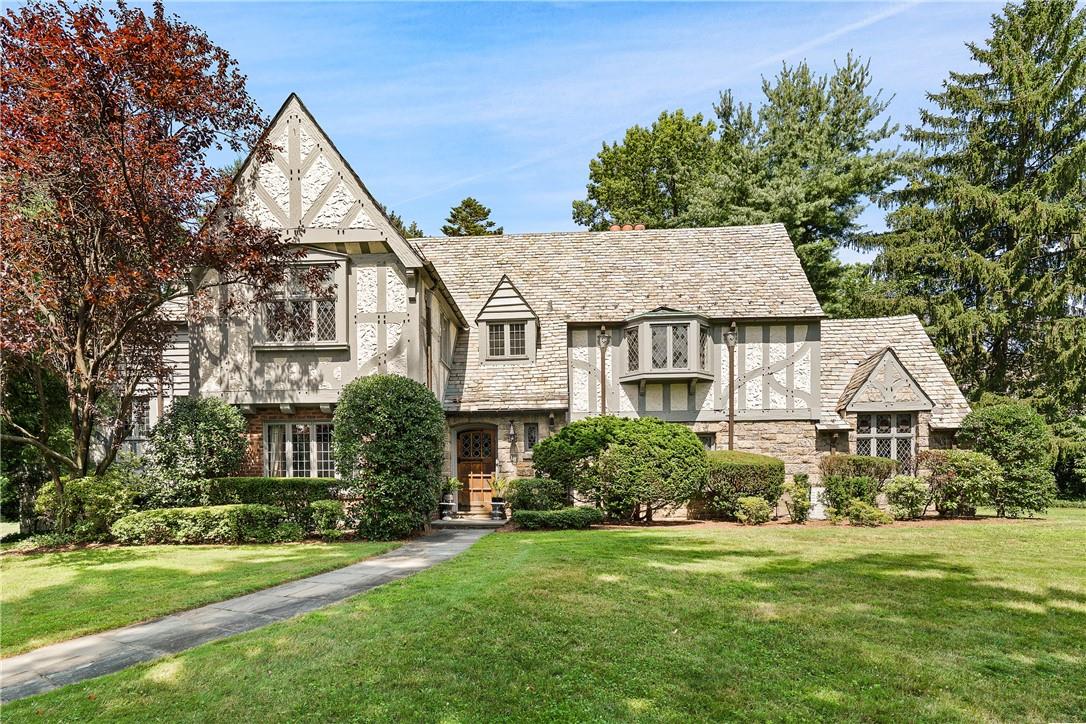 7 Hilltop Road Bronxville, NY 10708 - Photo 1 of 1 a view of a house with a yard