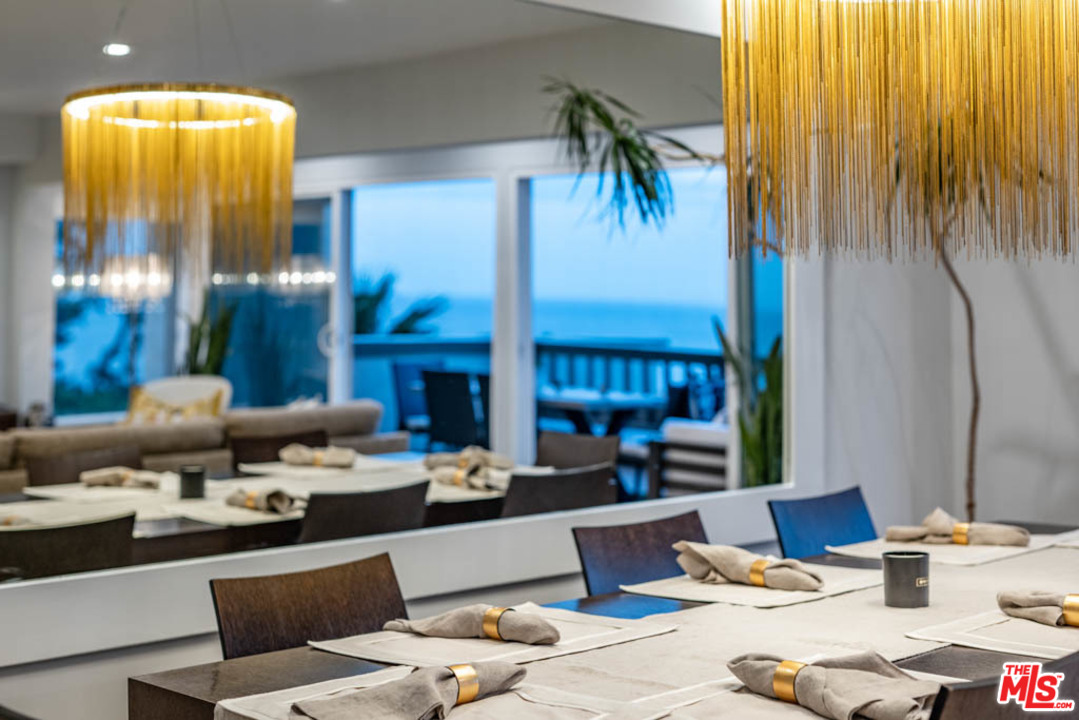 23910 De Way, Unit C Malibu, CA 90265 - Photo 15 of 45 a living room with furniture and a fireplace