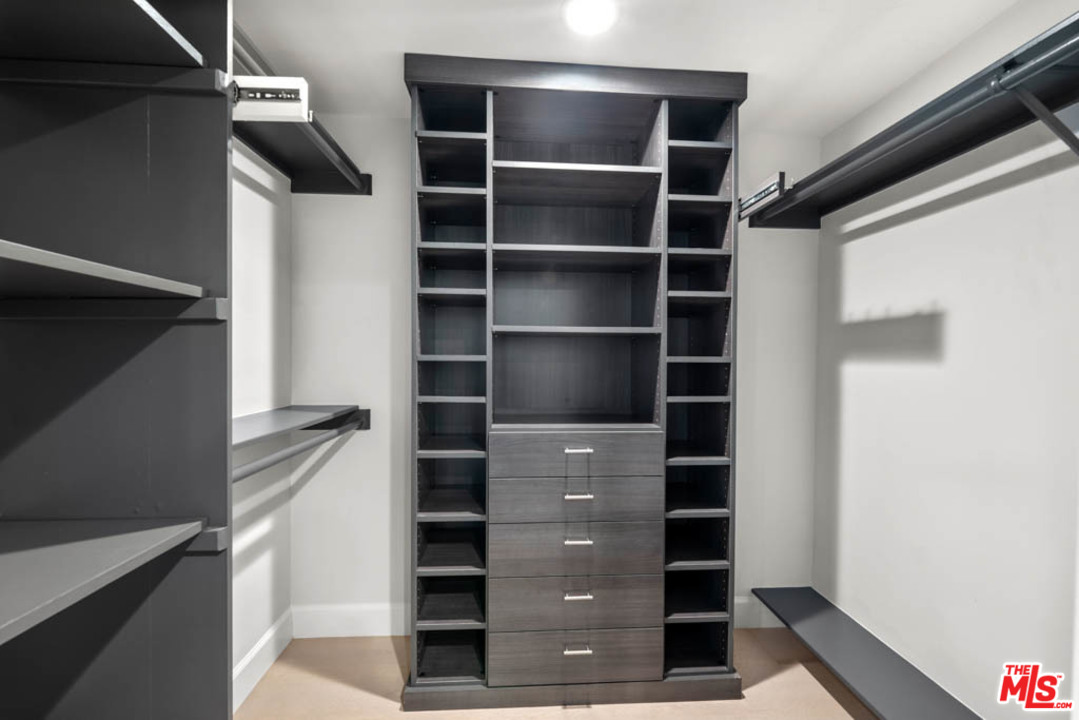 23910 De Way, Unit C Malibu, CA 90265 - Photo 31 of 45 a view of walk in closet with empty racks