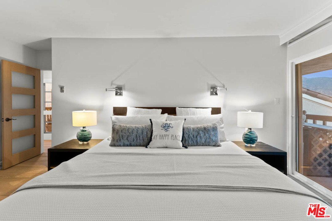 23910 De Way, Unit C Malibu, CA 90265 - Photo 40 of 45 a large white bed in a white room