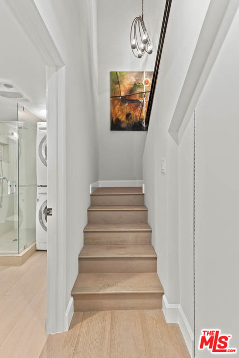 23910 De Way, Unit C Malibu, CA 90265 - Photo 43 of 45 a view of a hallway with front door