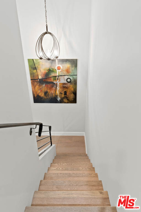 23910 De Way, Unit C Malibu, CA 90265 - Photo 44 of 45 a picture of a bathroom with a sink and a mirror