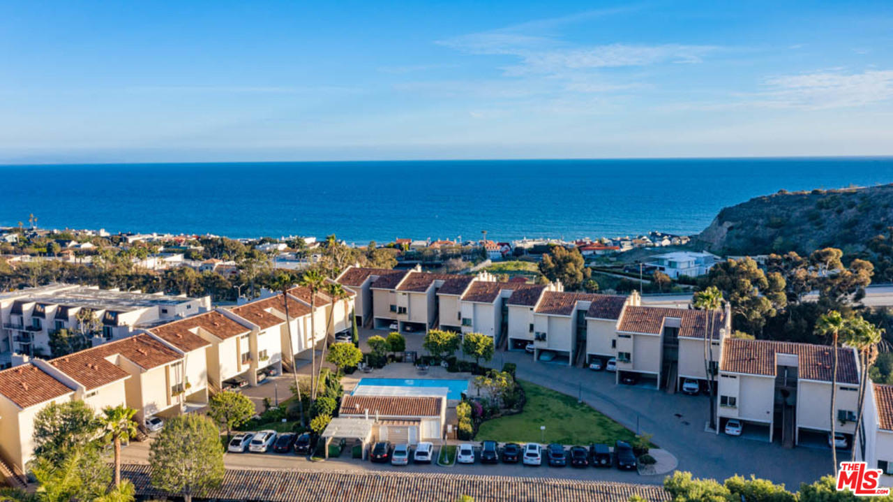 23910 De Way, Unit C Malibu, CA 90265 - Photo 6 of 45 a view of a city with lawn chairs