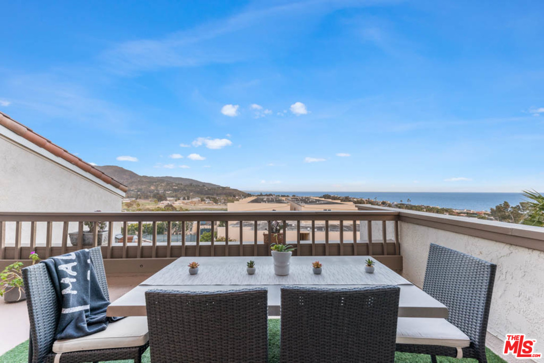 23910 De Way, Unit C Malibu, CA 90265 - Photo 8 of 45 a view of a balcony with furniture