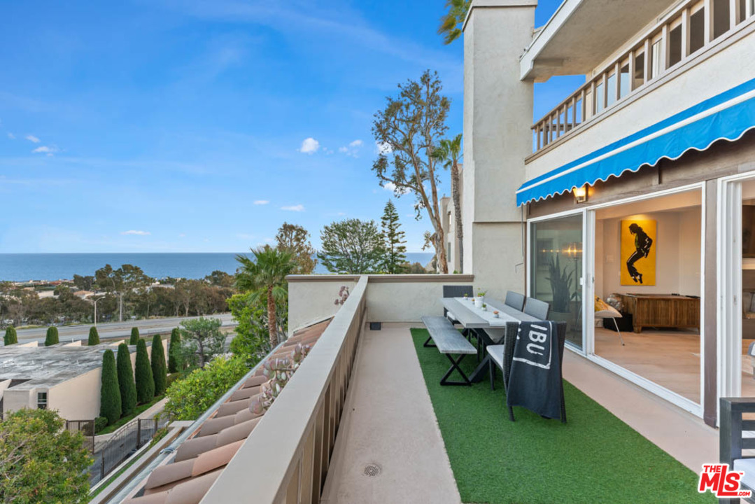23910 De Way, Unit C Malibu, CA 90265 - Photo 9 of 45 a view of a house with backyard porch and sitting area