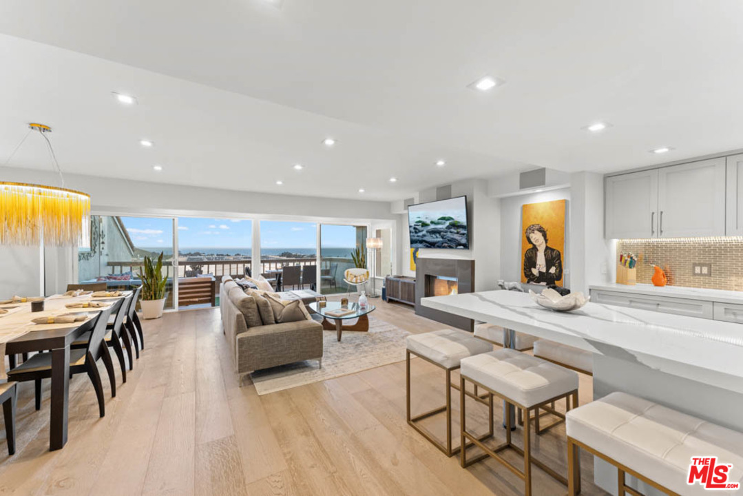 23910 De Way, Unit C Malibu, CA 90265 - Photo 10 of 45 a living room with furniture and a large window