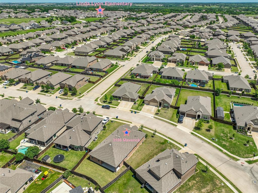 3106 Maverick Drive Forney, TX 75126 - Photo 30 of 32 an aerial view of residential houses with outdoor space