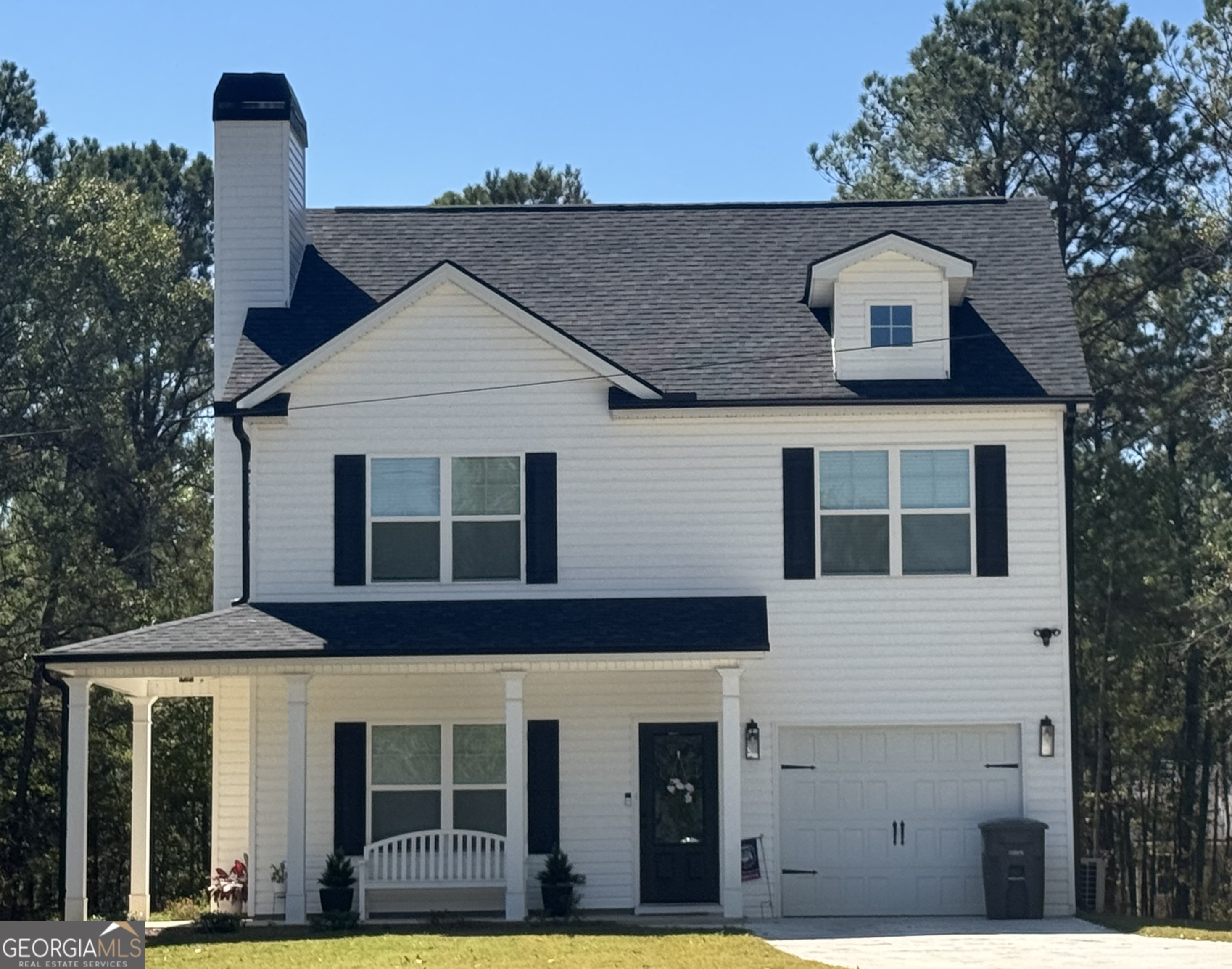 228 Welsh Trail Macon, GA 31216 - Photo 1 of 1 a front view of a house with large windows
