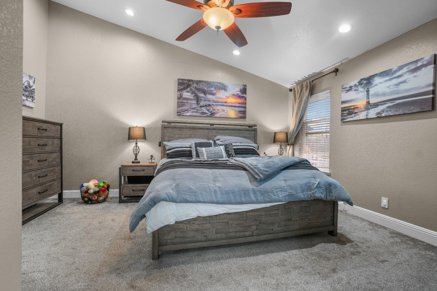 5125 Amaro Way Salida, CA 95368 - Photo 18 of 37 a spacious bedroom with a bed mirror and a desk