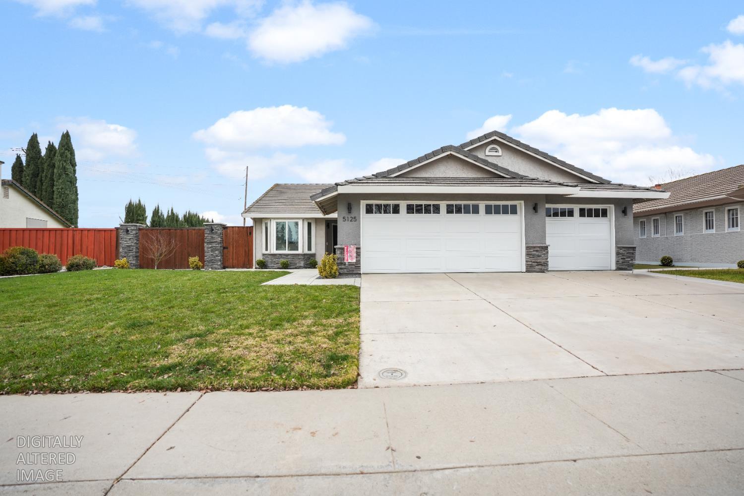 5125 Amaro Way Salida, CA 95368 - Photo 2 of 37 a front view of a house with garden