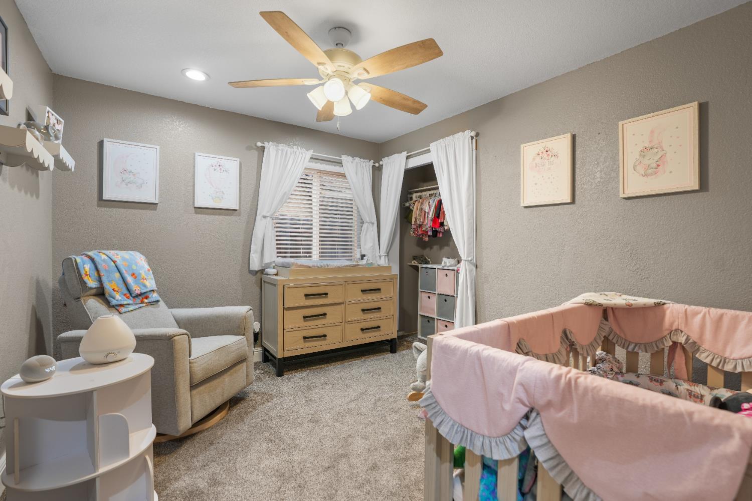 5125 Amaro Way Salida, CA 95368 - Photo 25 of 37 a living room with furniture and a flat screen tv