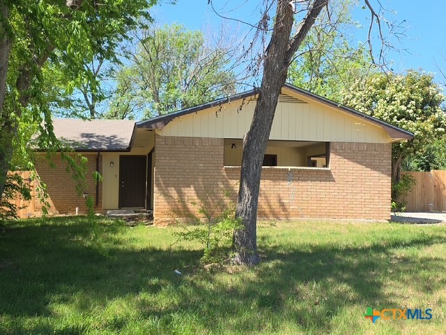 2010 South 15th Street, Unit B Temple, TX 76504 - Photo 2 of 12 a view of a house with backyard and garden