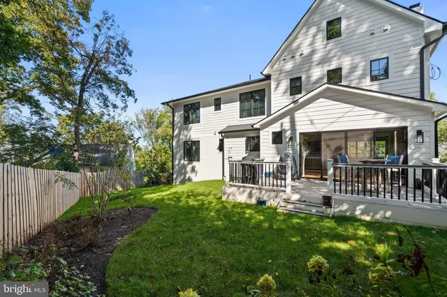 a view of a house with a yard porch and sitting area