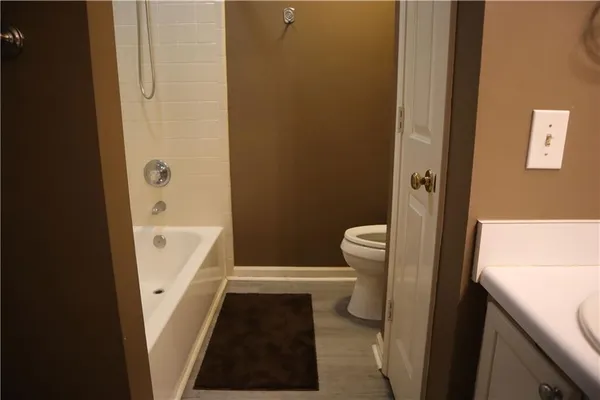 a bathroom with a sink and a toilet
