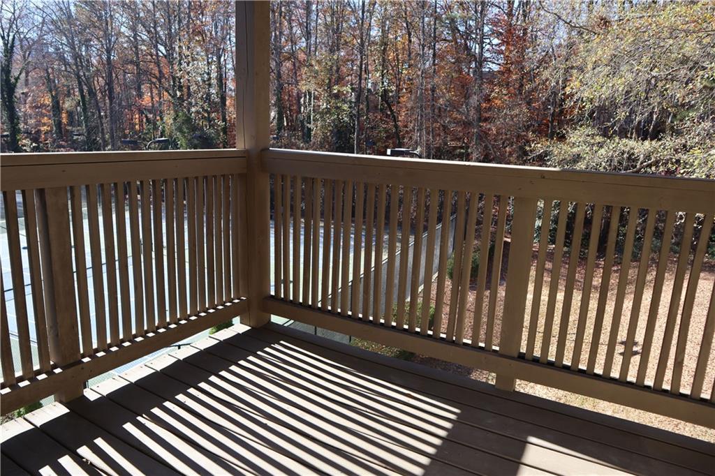 1103 Garden Court Atlanta, GA 30328 - Photo 13 of 17 a view of balcony with wooden floor
