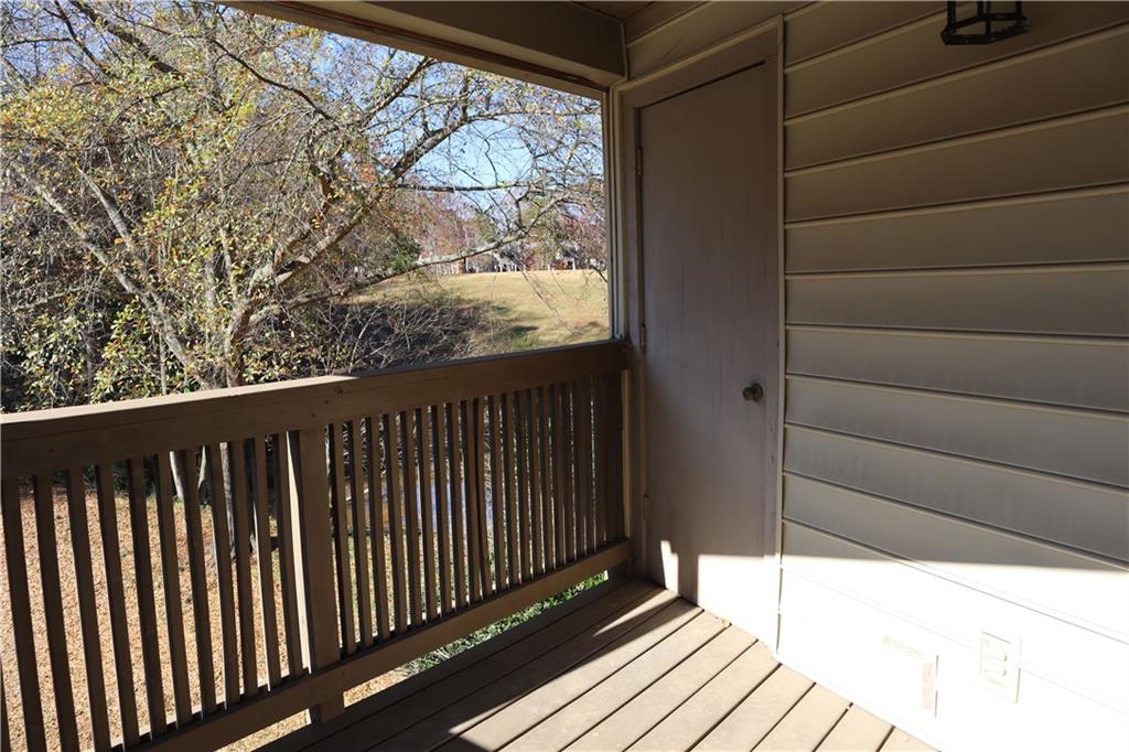 1103 Garden Court Atlanta, GA 30328 - Photo 17 of 17 a balcony with wooden floor