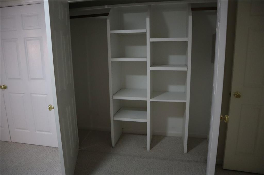 1103 Garden Court Atlanta, GA 30328 - Photo 8 of 17 a view of an empty walk in closet