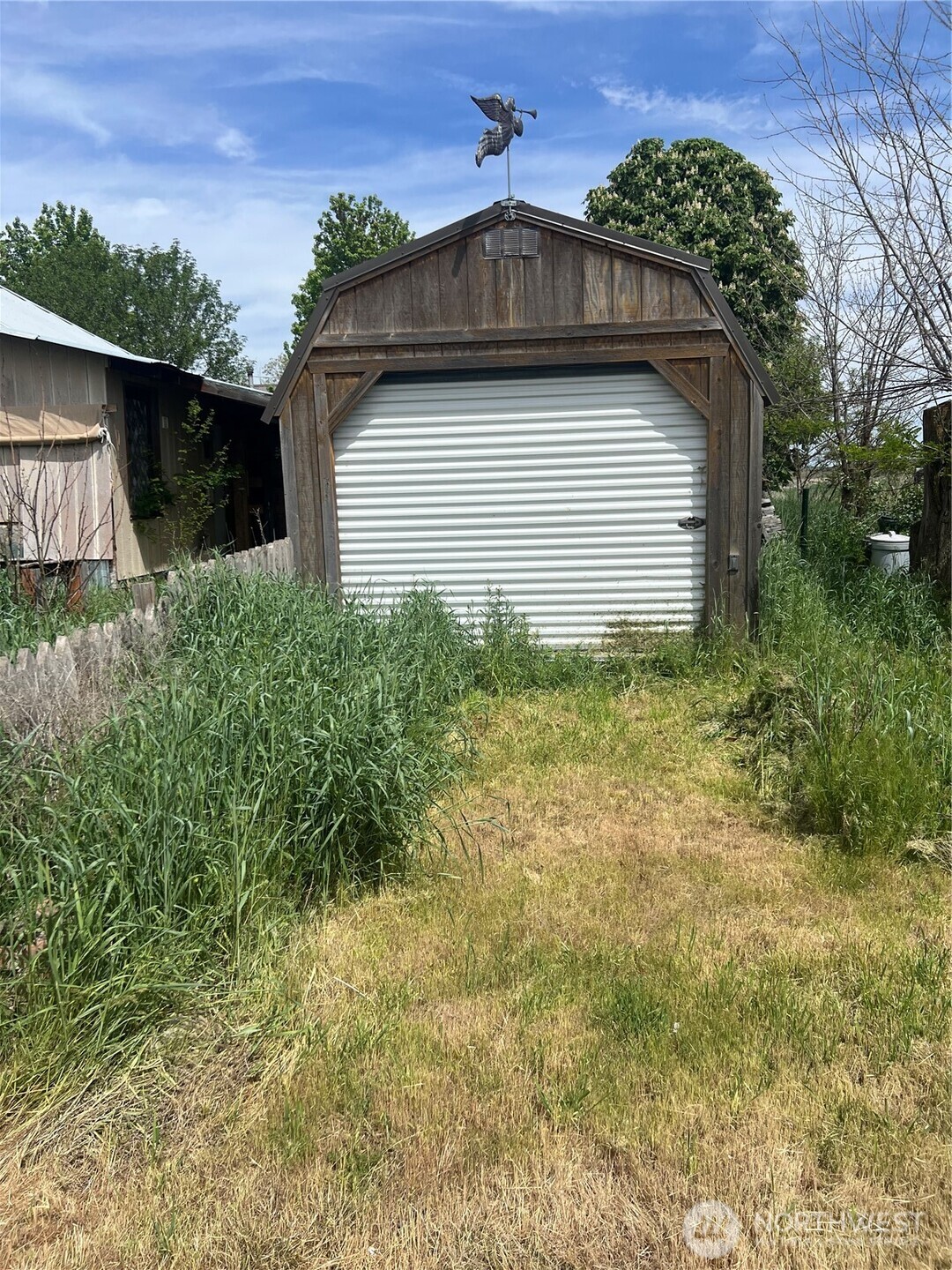 2965 Benge Winona Road Benge, WA 99105 - Photo 16 of 24 a front view of a house with a yard