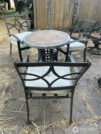 a table and chairs sitting on a roof