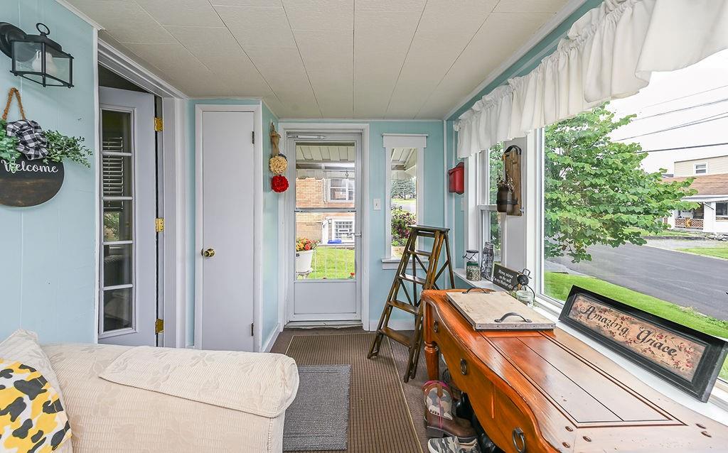 825 Childs Avenue Monaca, PA 15061 - Photo 11 of 35 a bedroom with furniture and a book shelf