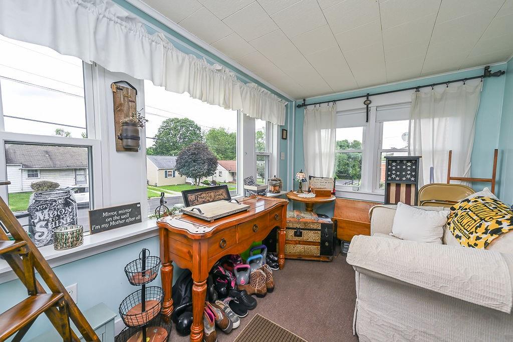 825 Childs Avenue Monaca, PA 15061 - Photo 13 of 35 a living room with furniture and a large window