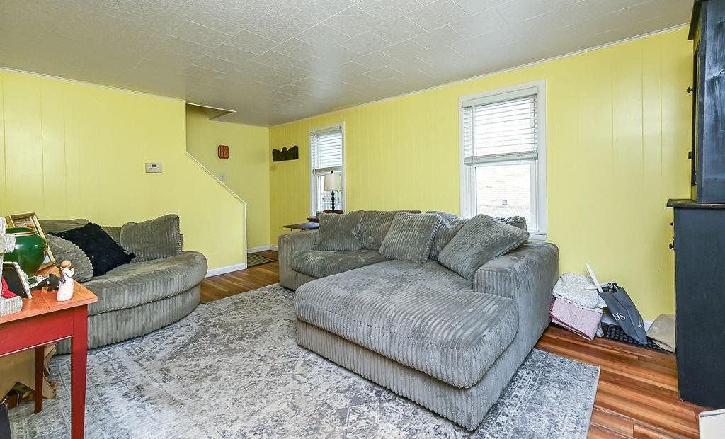 825 Childs Avenue Monaca, PA 15061 - Photo 15 of 35 a living room with couches and painting on the wall