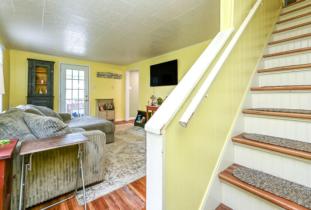 825 Childs Avenue Monaca, PA 15061 - Photo 18 of 35 a living room with furniture and a floor to ceiling window