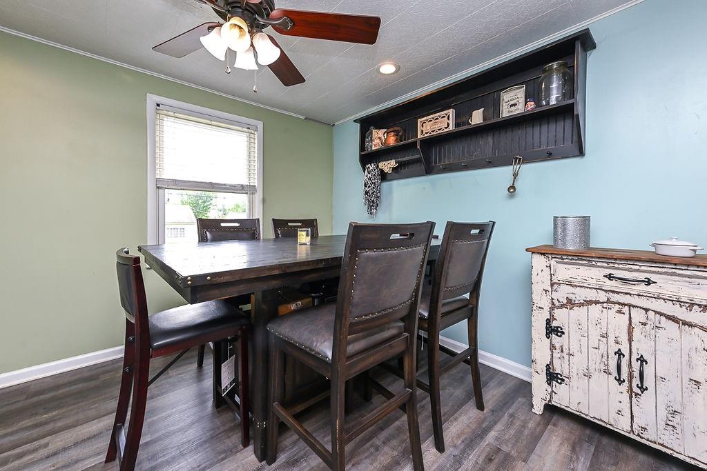 825 Childs Avenue Monaca, PA 15061 - Photo 19 of 35 a view of a dining room with furniture and wooden floor