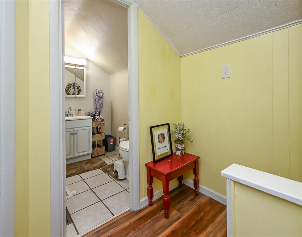825 Childs Avenue Monaca, PA 15061 - Photo 28 of 35 a bathroom with a sink a toilet and a mirror