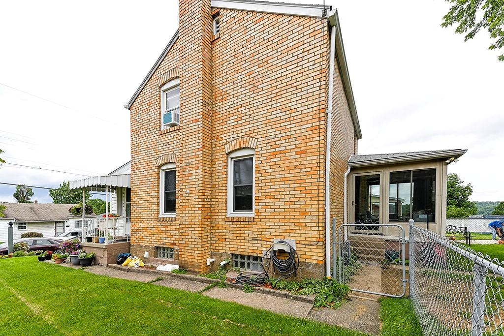 825 Childs Avenue Monaca, PA 15061 - Photo 7 of 35 a backyard of a house with table and chairs