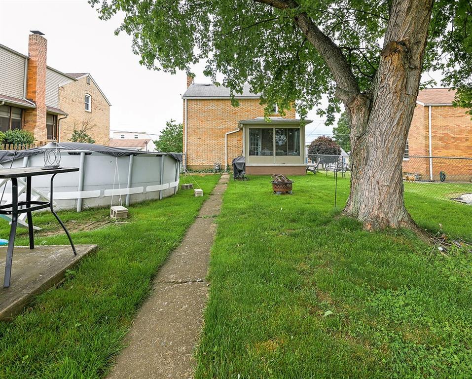 825 Childs Avenue Monaca, PA 15061 - Photo 9 of 35 a front view of a house with backyard