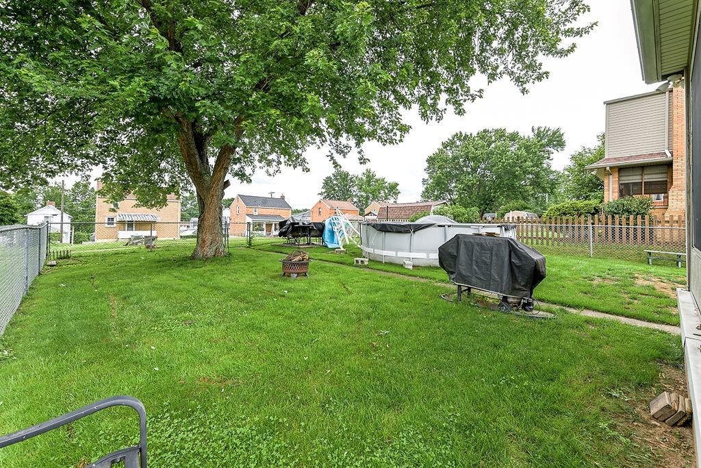 825 Childs Avenue Monaca, PA 15061 - Photo 10 of 35 a backyard of a house with table and chairs