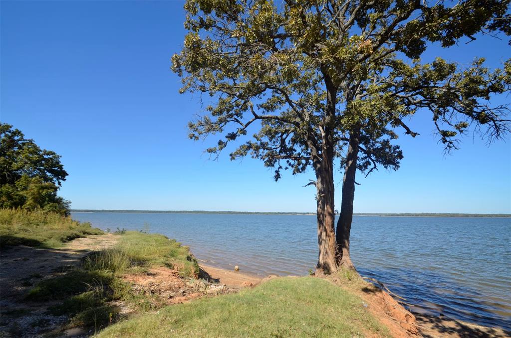 1125 Lake Road Gordonville, TX 76245 - Photo 9 of 17 a view of a yard with an ocean view