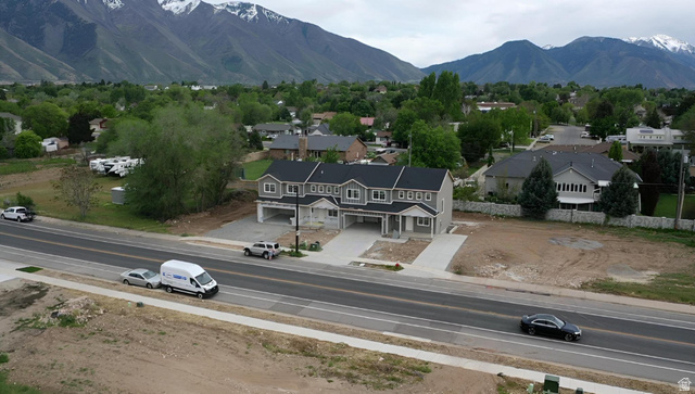 630 East 800 S Street Springville, UT 84663 - Photo 5 of 5 Modern gray siding townhome with white trim and black shingle roof
