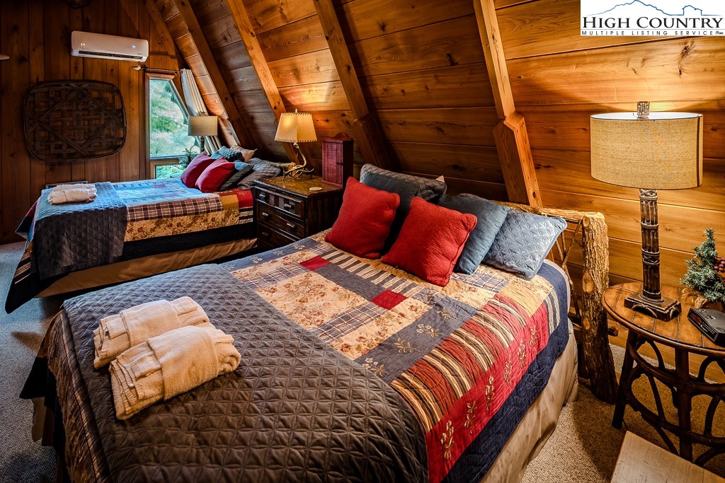 268 Cherry Drive Boone, NC 28607 - Photo 12 of 33 a bedroom with two beds and a lamp