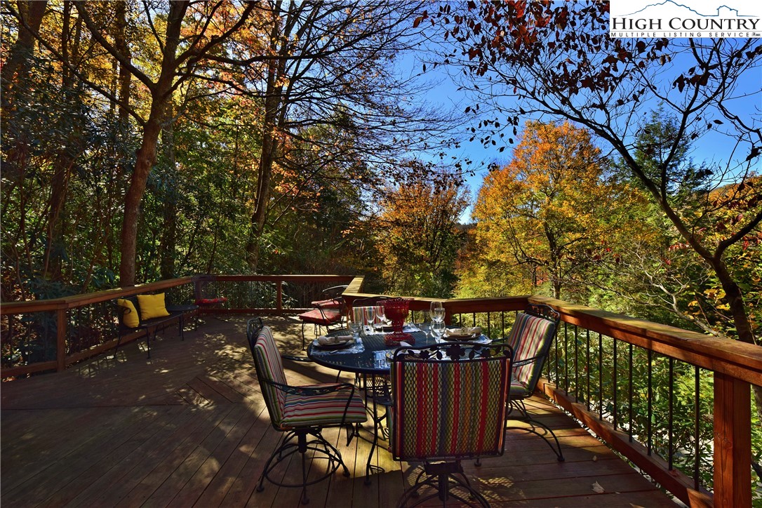 268 Cherry Drive Boone, NC 28607 - Photo 17 of 33 a view of a chairs and table on the wooden floor