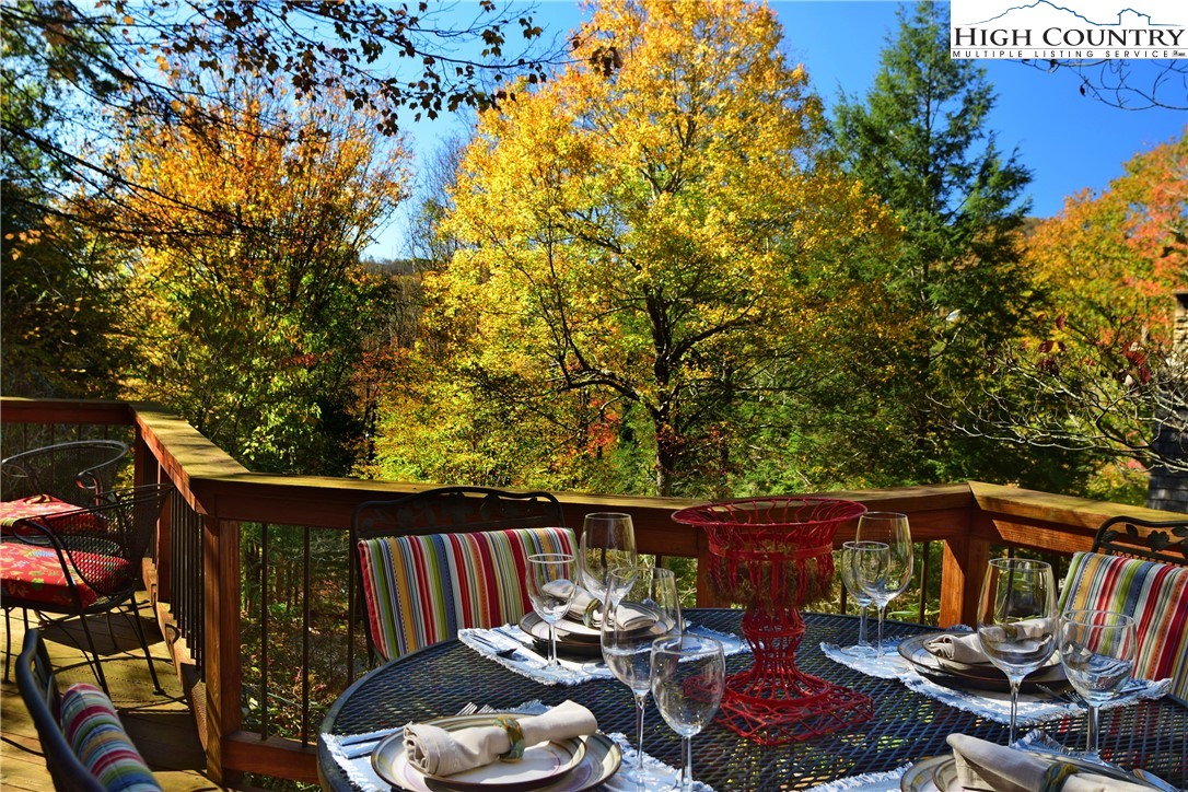 268 Cherry Drive Boone, NC 28607 - Photo 18 of 33 a view of balcony with furniture and potted plants