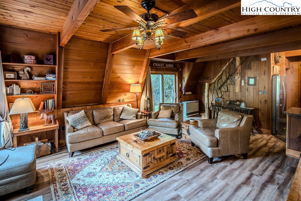 268 Cherry Drive Boone, NC 28607 - Photo 20 of 33 a living room with furniture and a rug