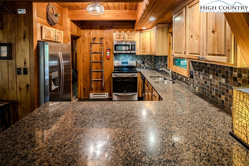 268 Cherry Drive Boone, NC 28607 - Photo 24 of 33 a view of a back yard of the house